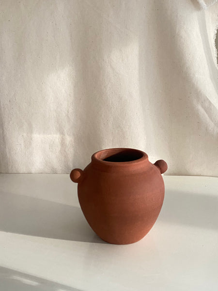 Small red clay vase
