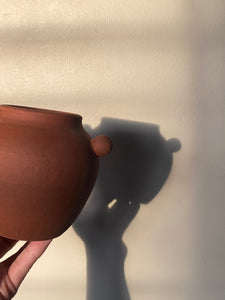 Small red clay vase